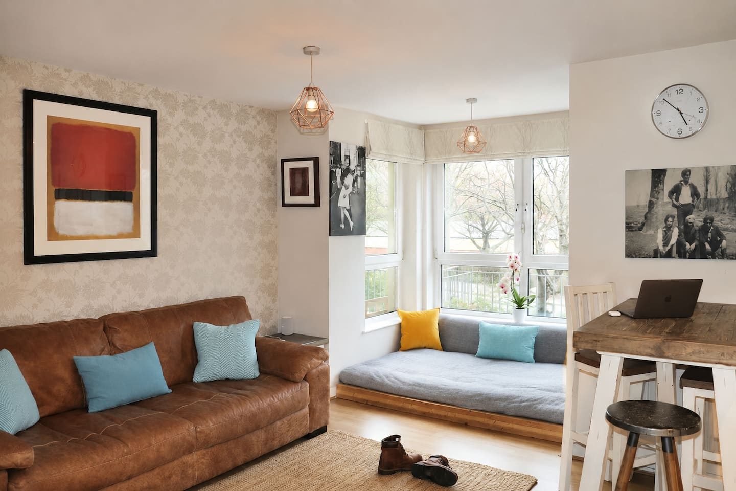 The living room, with its window seat and waterfront light